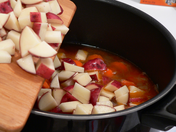 add-potatoes to mexican fish stew | www.4hourbodygirl.com