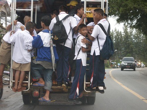 Kids on the bus in Thailand | www.4hourbodygirl.com